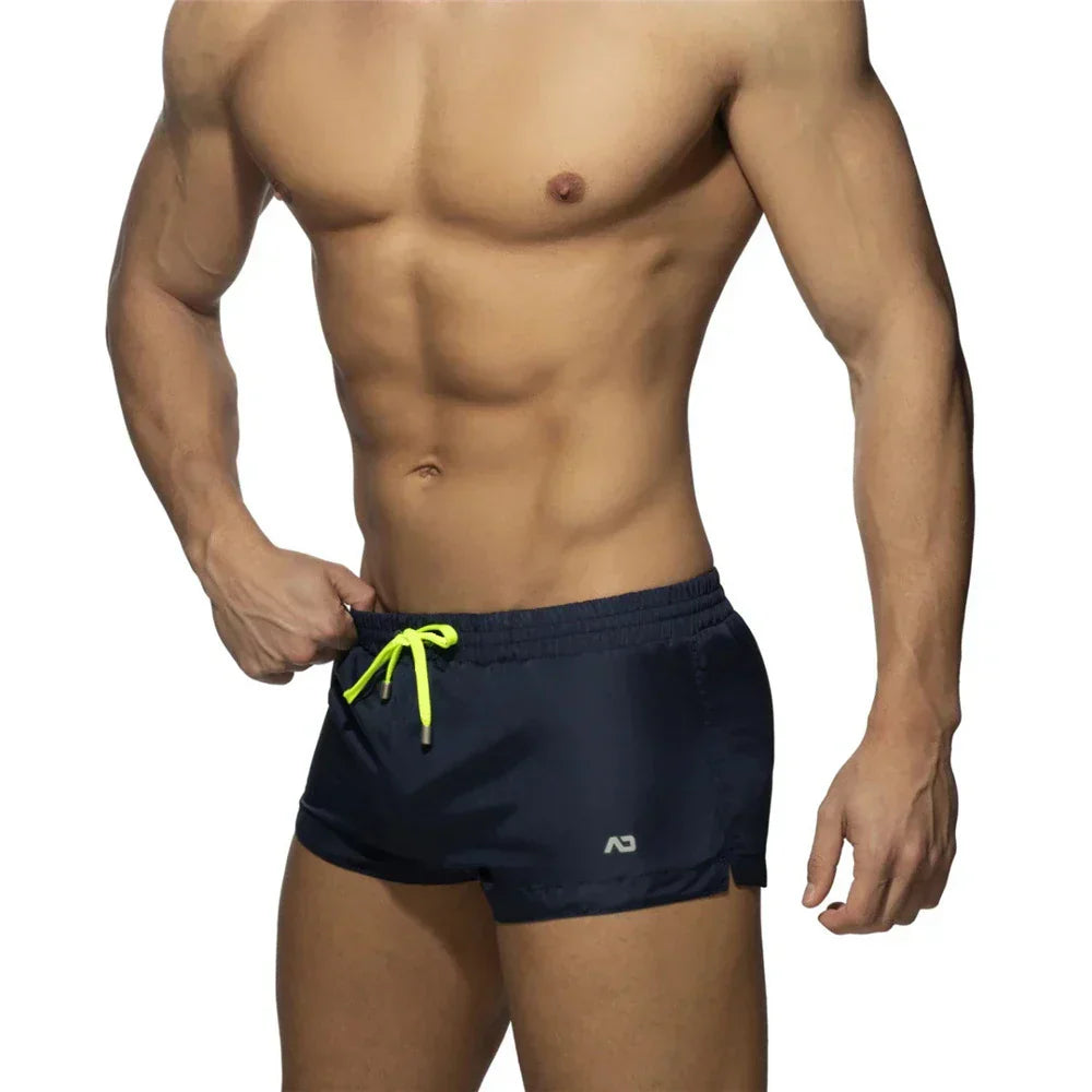 New Mens Swimming Trunks Classic Solid Color Three Point Quick Drying Swimming Trunks Low Waist Sexy Beach Surfing Sports Shorts