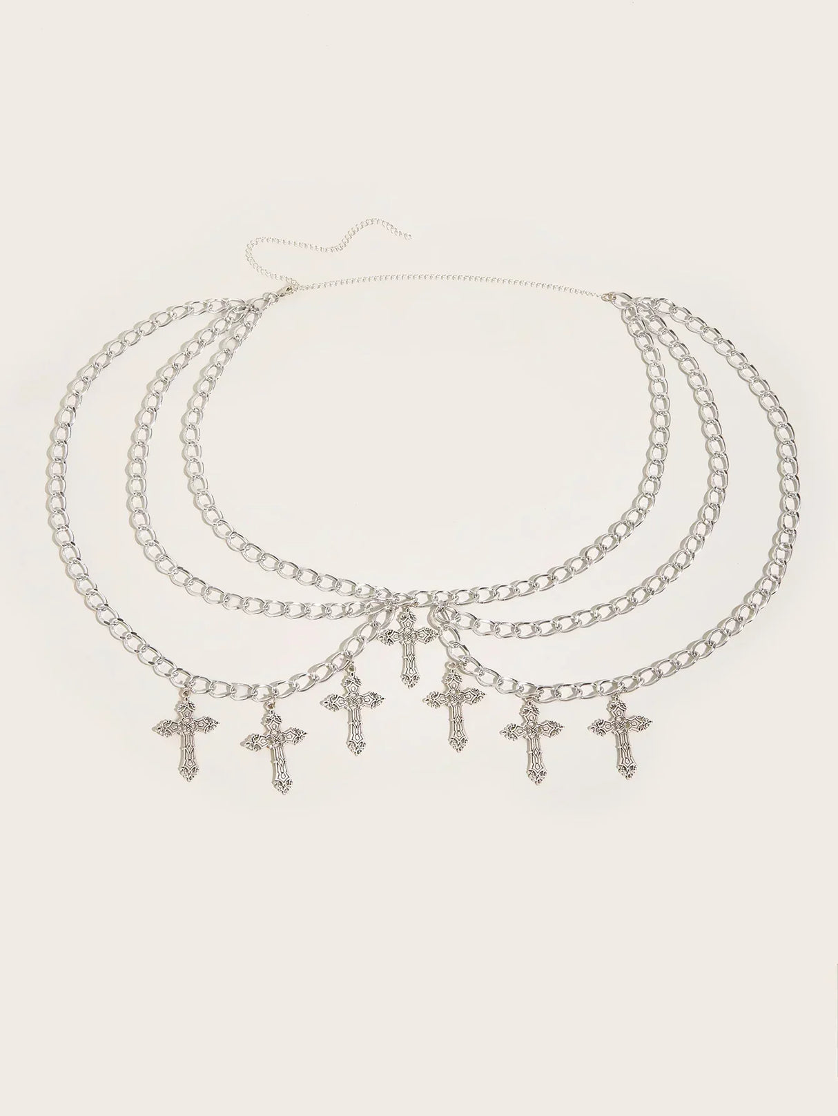 Alloy hollowed out cross pendant with wavy side swing waist chain and sexy multi-layer body chain