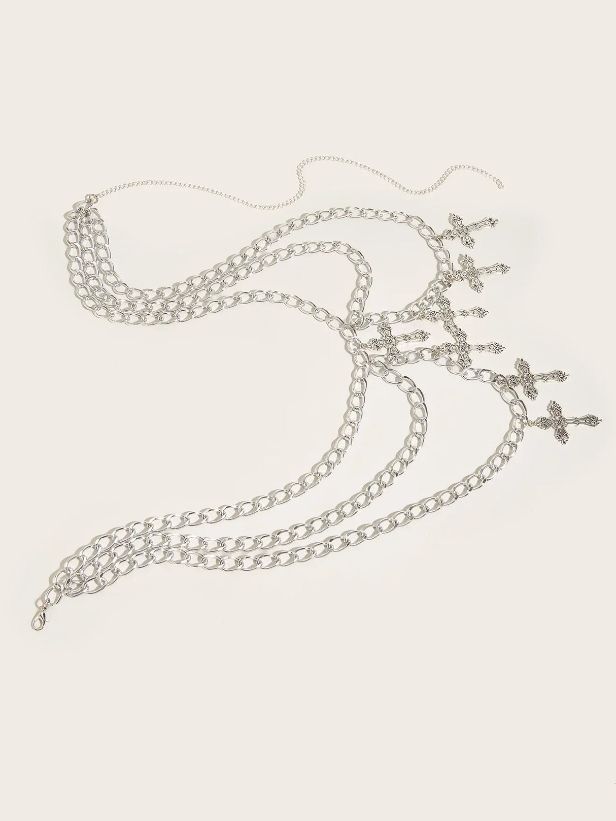 Alloy hollowed out cross pendant with wavy side swing waist chain and sexy multi-layer body chain
